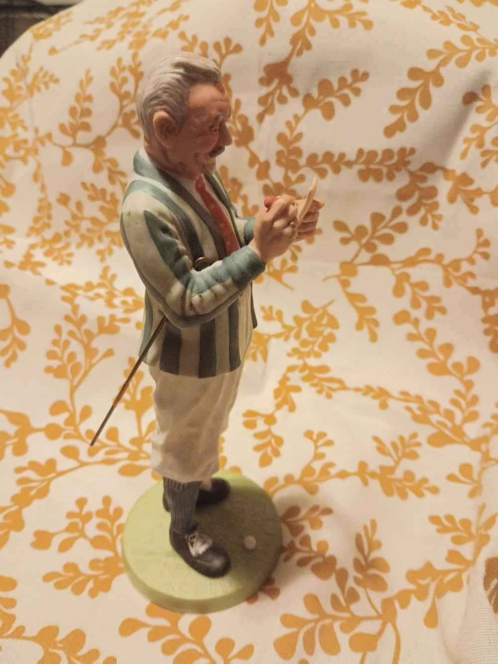 Norman Rockwell Ceramic Figurine in Cream and Green